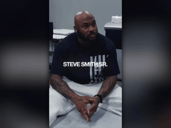 NFL legend Steve Smith smiling after his successful LASIK surgery experience at The LASIK Center.