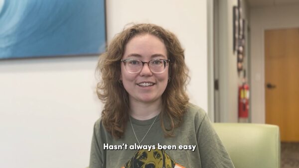 LASIK patient reacting with excitement right after her five-minute procedure.